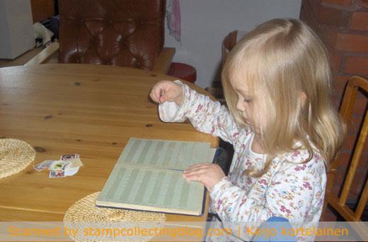 My youngest kid (soon 3 years) playing with some of her stamps.
