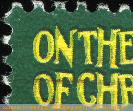 A close-up of the top text. Notice how the background color is pushing it's way through on the edges of letters. 