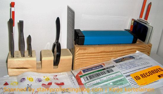 A handy holder for tweezers, perf gauge etc. philatelic accessories. 